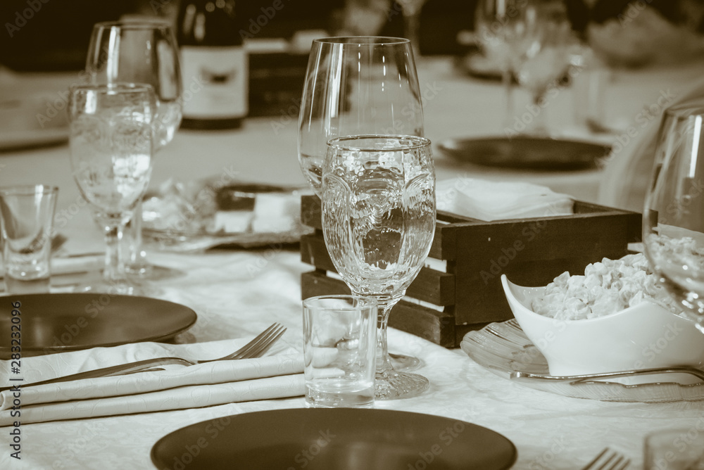 Table setting for dinner or holiday, retro film style, selective focus