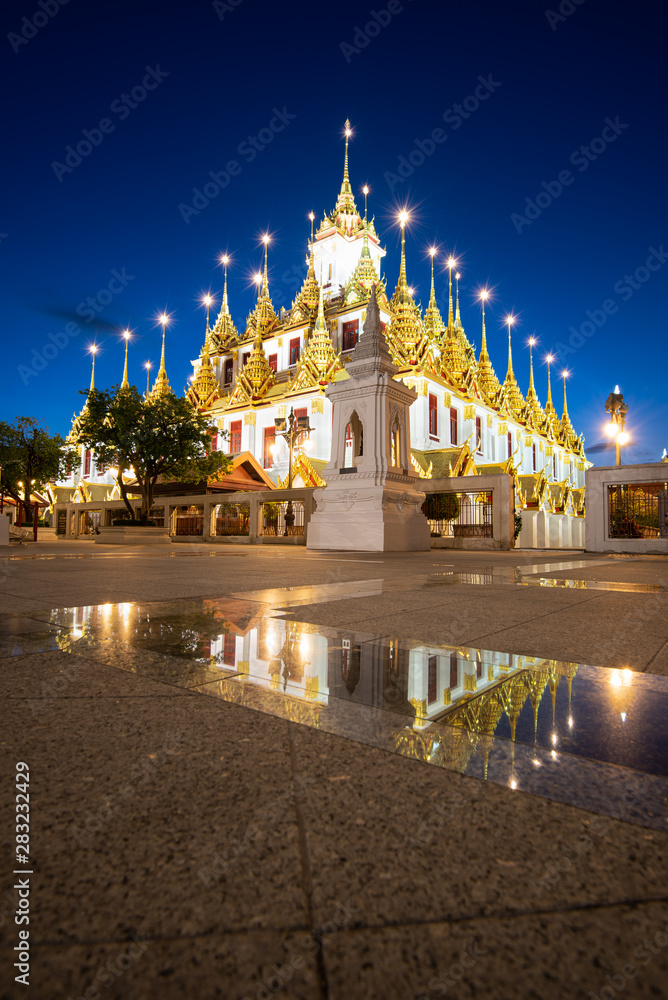 Wat Ratchanatdaram and Loha Prasat Metal Castle at twilight, landmark and famous place of Bangkok, Thailand