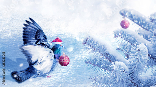 Christmas fabulous image. A dove in a santa claus hat decorates a Christmas tree in a winter magic forest. New Year card. Winter wonderland.
