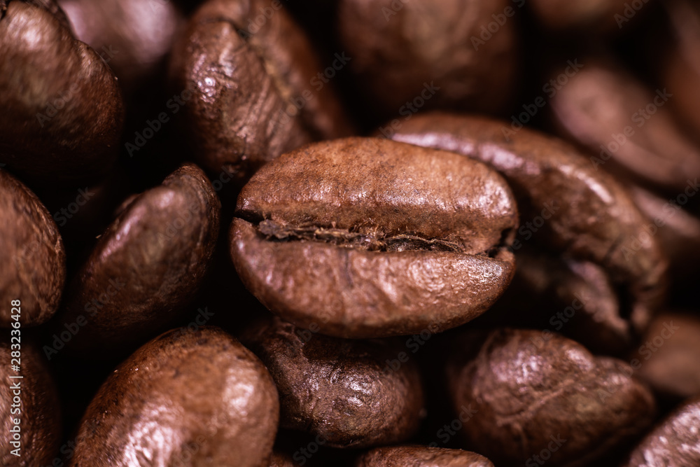 Roast coffee beans macro shot and texture details. Roast coffee beans macro shot and texture details.