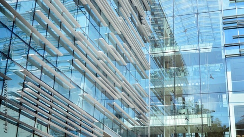  Modern office building with reflection in windows of building. New office building in the city center.