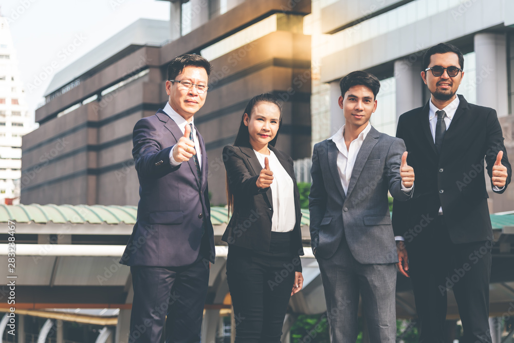 Asian business men and woman Showing the power of the teamwork, In working synergy together To be successful, to business concept. Asian business men and woman Showing the power of the teamwork, In working synergy together To be successful, to business concept.