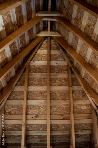 Wooden roof with beams