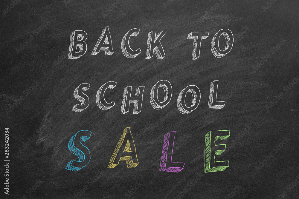 Fototapeta premium Back to School SALE. Text on blackboard.