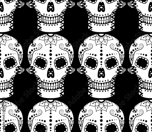 Vector seamless pattern of white sugar skull with ethnic ornament on black background. Illustration for Mexican Day of the Dead