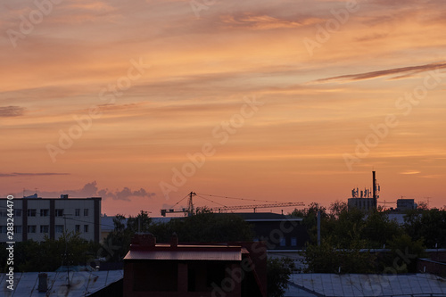 Beautiful sunset over a provincial town, city at dusk © nikolay_alekhin