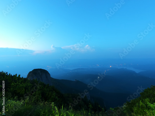 calm night landscape with blue sky after sunset. mountain view