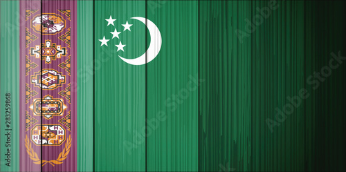 Flag of Turkmenistan,  wooden background. photo