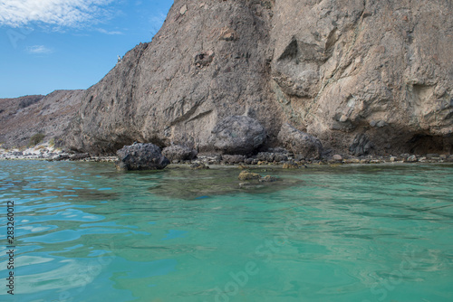 Crystal clear water of Balandra Beach, in a summer day of vacations, La Paz Baja California Sur. MEXICO