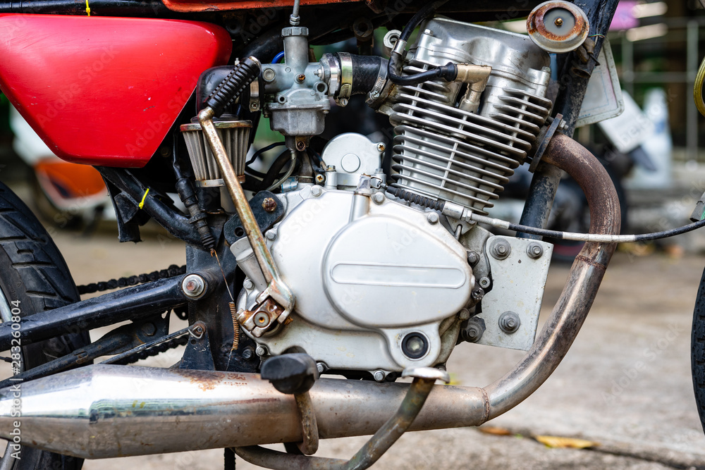 The engine of an old motorcycle that is still working normally The engine of an old motorcycle that is still working normally