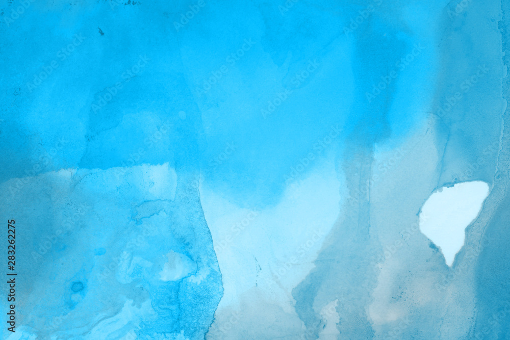 Obraz premium Hand painted blue alcohol ink background. Abstract delicate winter season texture. Contemporary wallpaper. 