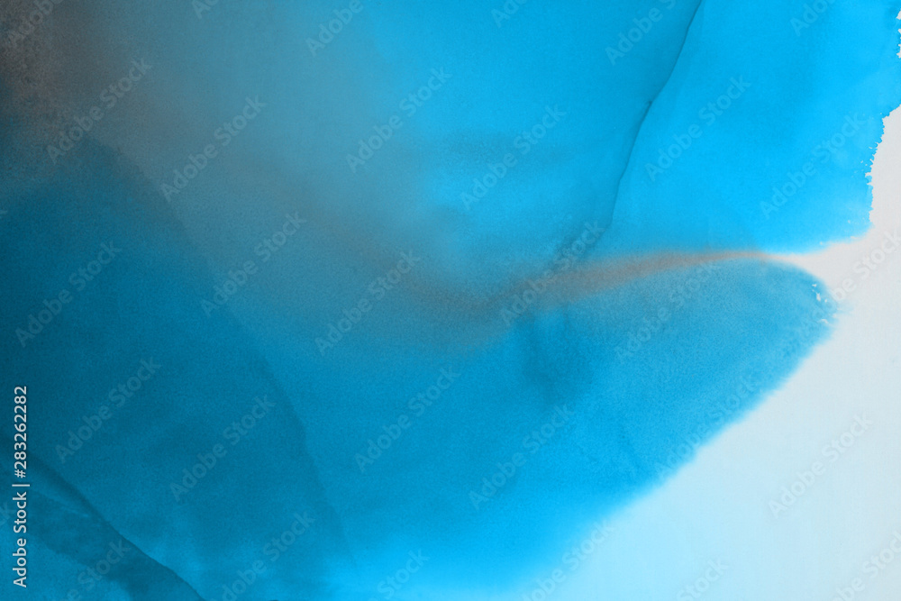 Fototapeta premium Hand painted blue alcohol ink background. Abstract delicate winter season texture. Contemporary wallpaper. 