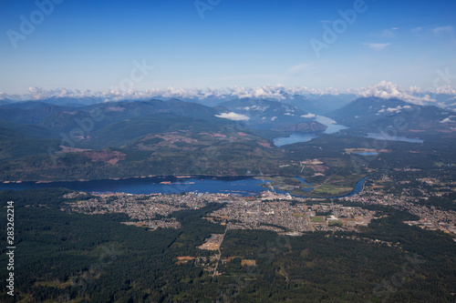Aerial view of a small town, Port Alberni, on Vancouver Island during a sunny summer morning. Located in British Columbia, Canada.