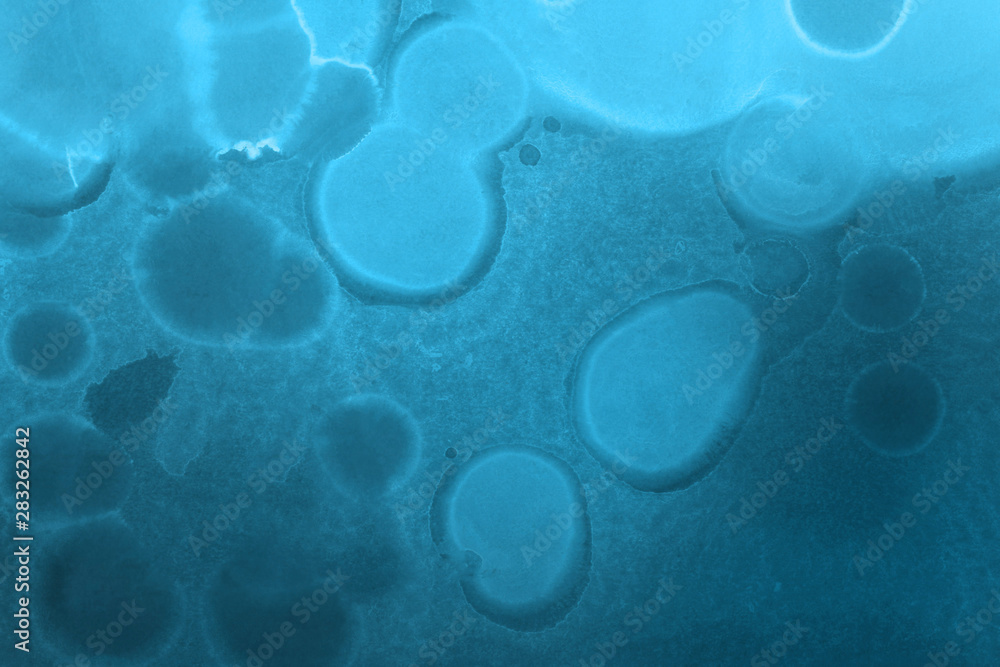 Hand painted blue alcohol ink background. Abstract delicate winter season texture. Contemporary wallpaper. Hand painted blue alcohol ink background. Abstract delicate winter season texture. Contemporary wallpaper.