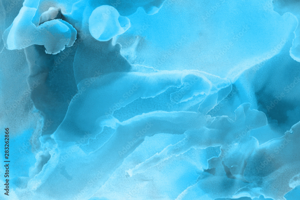 Hand painted blue alcohol ink background. Abstract delicate winter season texture. Contemporary wallpaper. Hand painted blue alcohol ink background. Abstract delicate winter season texture. Contemporary wallpaper.