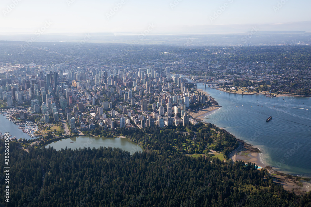 Aerial View of a Modern Downtown City during a sunny summer day. Taken in Vancouver, British Columbia, Canada.
