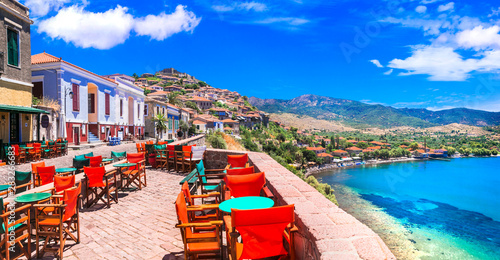 Fototapeta Naklejka Na Ścianę i Meble -  Traditional colorful Greece series - street bars and taverns of Molivos town, Lesvos island