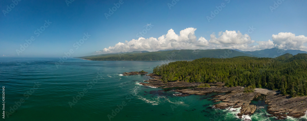 Beautiful Aerial Panoramic Landscape View of the Rocky Pacific Ocean Coast in the Southern Vancouver Island during a sunny summer day. Taken between Victorial and Port Renfrew, BC, Canada.