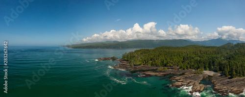 Beautiful Aerial Panoramic Landscape View of the Rocky Pacific Ocean Coast in the Southern Vancouver Island during a sunny summer day. Taken between Victorial and Port Renfrew, BC, Canada.