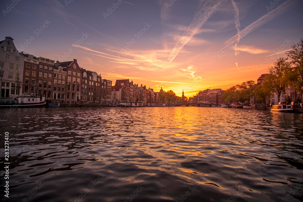 Beautiful sunset on canal in Amsterdam, Netherlands