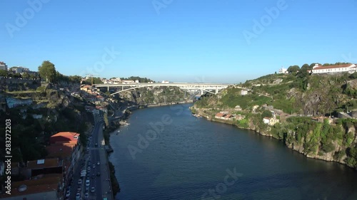 Panoramic view from hills of Vila Nova de Gaia with Monastery of Serra do Pilar, wine cellars and Ponte Infante Dom Henrique bridge over Douro river to Funicular dos Guindais railway in Porto side photo