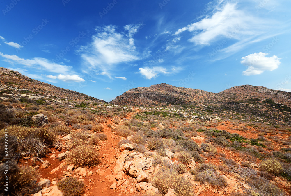 Fototapeta premium Landscpae of rocky Desert over blue sky
