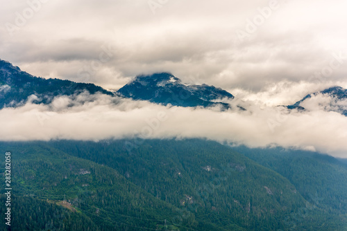 Aerial View at Mountains on Foggy and Misty Fall Morning in British Columbia, Canada.  © karamysh