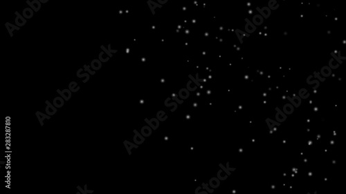 Snow white is falling through the black background in winter. Suitable for computer graphics effects in movie scenes., 4K video 