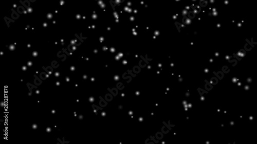Snow white is falling through the black background in winter. Suitable for computer graphics effects in movie scenes., 4K video 