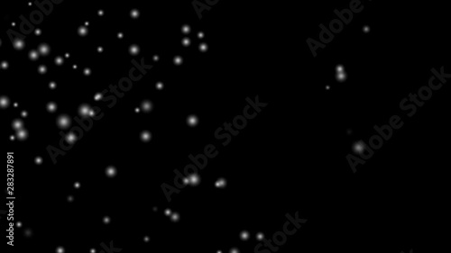 Snow white is falling through the black background in winter. Suitable for computer graphics effects in movie scenes., 4K video 