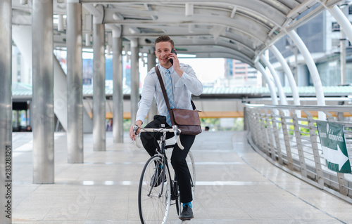 Young Business man with Bicycle for go to Work. Financial man business Office Company Lifestyle for working Corporate. 