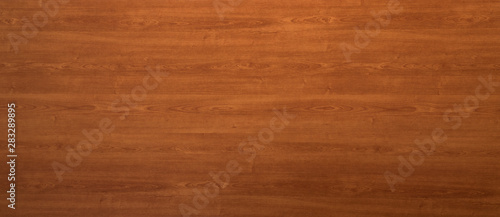 Wooden panel background texture with red woodgrain