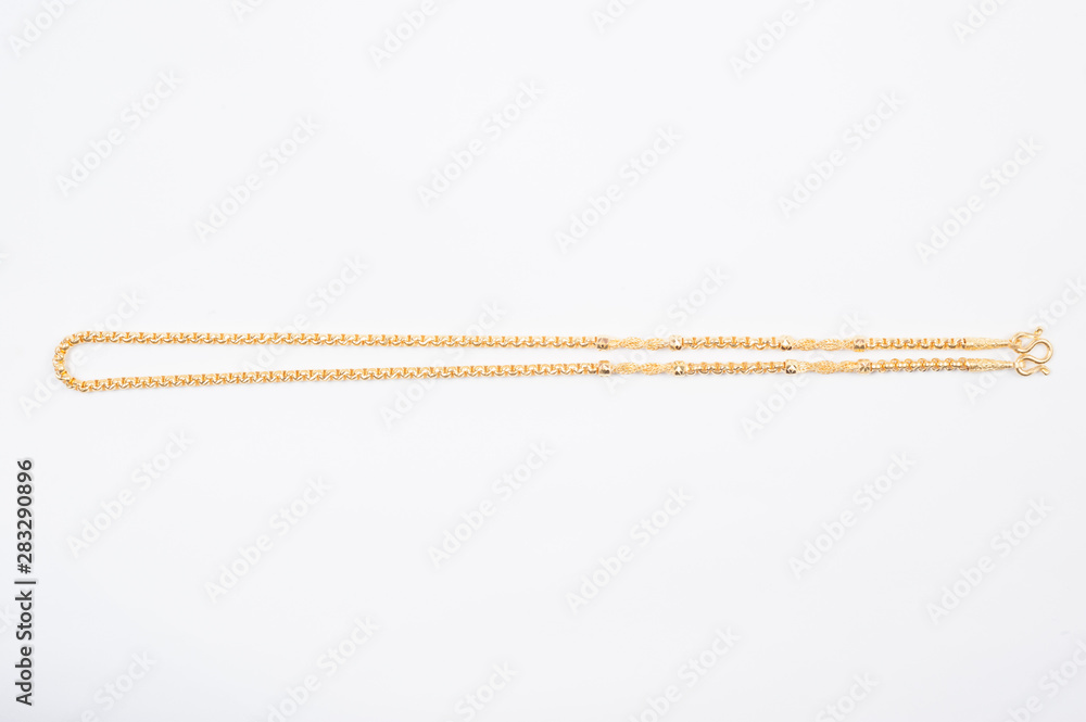 Gold chain necklace isolated on white background. Gold chain necklace isolated on white background.