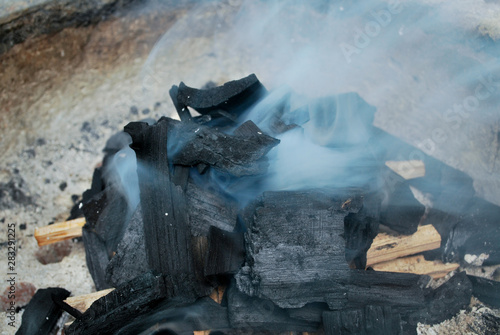 Ancient fire by using charcoal from wood.