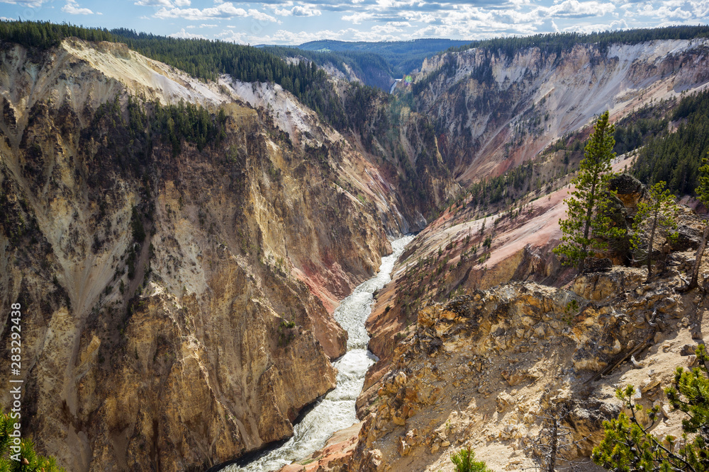 River in the deep valley of the Grand Canyon in Yellowstone River, Yellowstone National Park, Wyoming, United States.