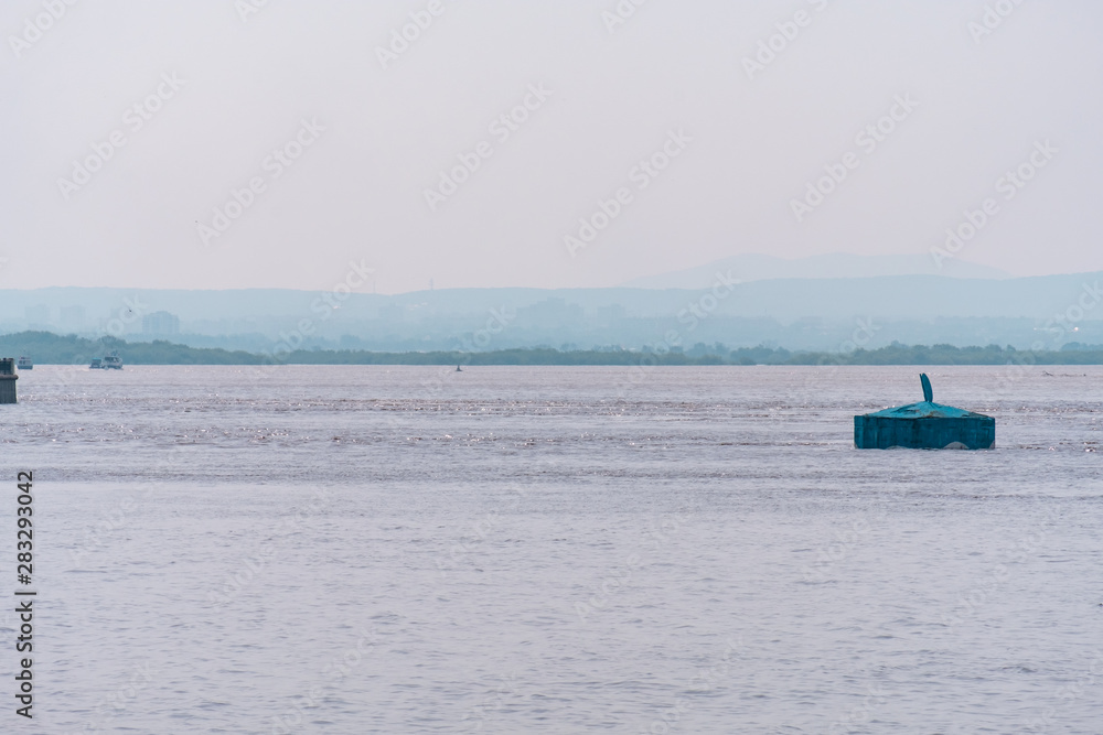 Khabarovsk, Russia - Aug 08, 2019: Flood on the Amur river near the city of Khabarovsk. The level of the Amur river at around 159 centimeters.