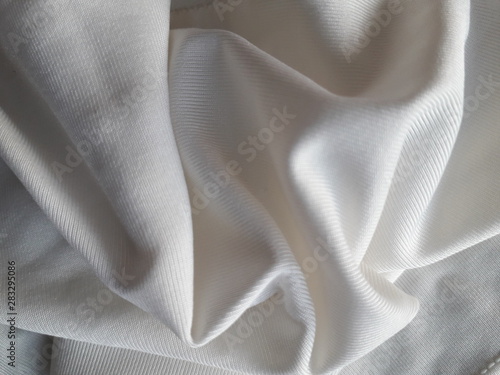 White background fabric Swaying like a silk thread when hit by the wind.