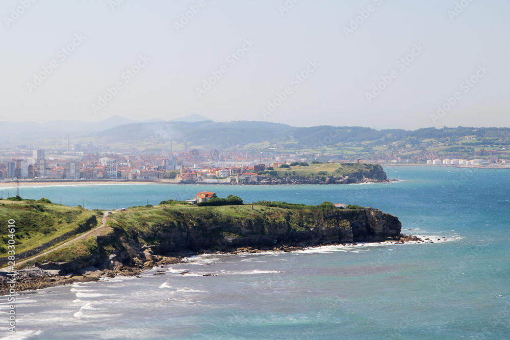 Coastline in Gijon, view to cliffs and ocean