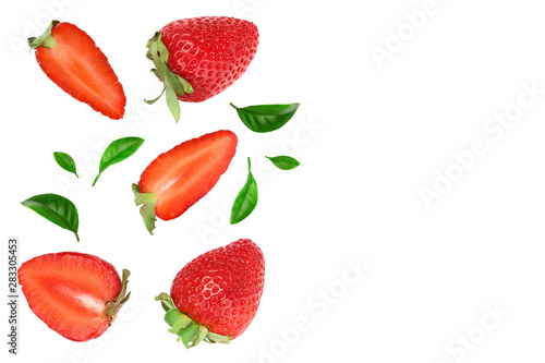 Strawberries decorated with green leaves isolated on white background with copy space for your text. Top view. Flat lay pattern