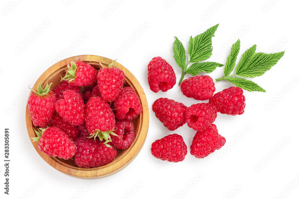raspberries in wooden bowl with leaves isolated on white background. Top view. Flat lay raspberries in wooden bowl with leaves isolated on white background. Top view. Flat lay