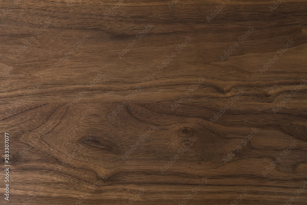 Real black walnut wood texture with natural grain Real black walnut wood texture with natural grain