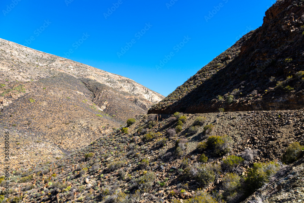 Mountain pass through a valley
