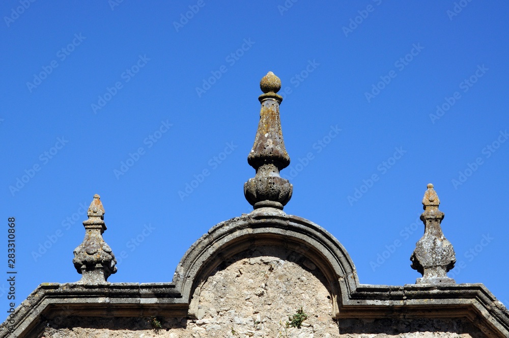 Fototapeta premium Architectural detail on top of the Philip V arch in the old town, Ronda, Andalusia, Spain.