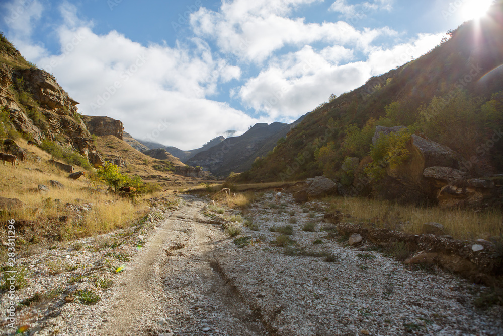 Photo of mountainous area, road , cloudy sky on summer Photo of mountainous area, road , cloudy sky on summer