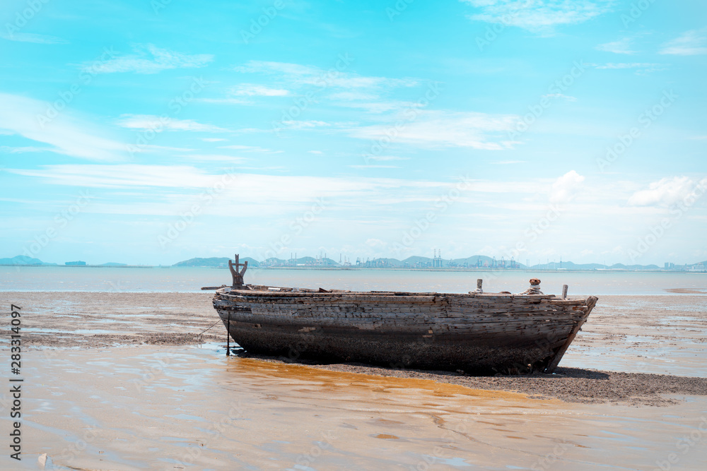 Old wooden boat that beached on the beach Old wooden boat that beached on the beach