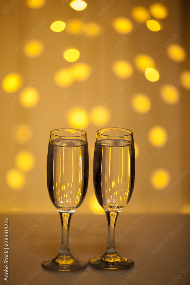 Glasses on a background of illumination Glasses on a background of illumination