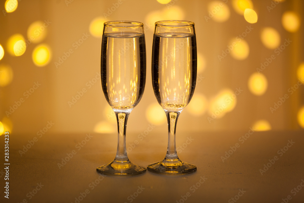 Glasses on a background of illumination Glasses on a background of illumination