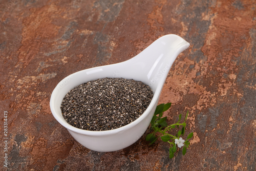 Dietary Chia seeds in the bowl Dietary Chia seeds in the bowl