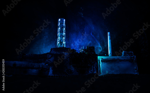 Creative artwork decoration. Chernobyl nuclear power plant at night. Layout of abandoned Chernobyl station after nuclear reactor explosion.