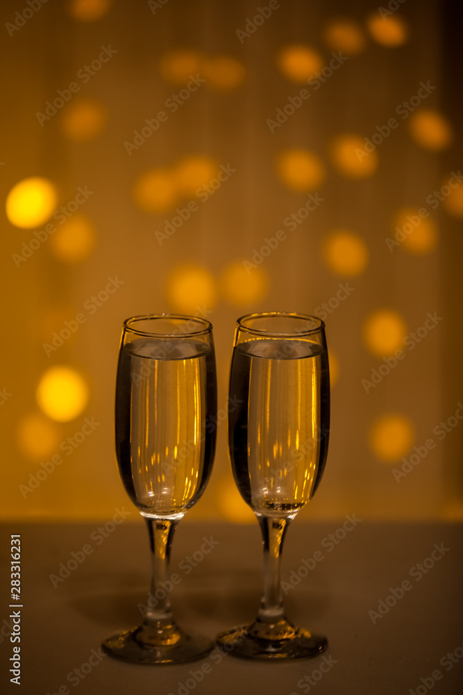 Glasses on a background of illumination Glasses on a background of illumination